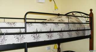 Хостел Хостел Home Hostel NN Нижний Новгород Односпальная кровать в улучшенном номере на 4 человека-3