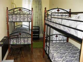 Хостел Хостел Home Hostel NN Нижний Новгород Односпальная кровать в в номере на 4 человека-1